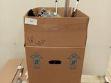 a cardboard box that has some kind of umbrella inside of it