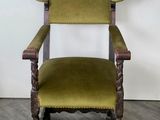 an old wooden chair with green upholstered upholstered upholstered upholstered upholstered