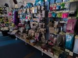 many items on the shelves in the store for sale
