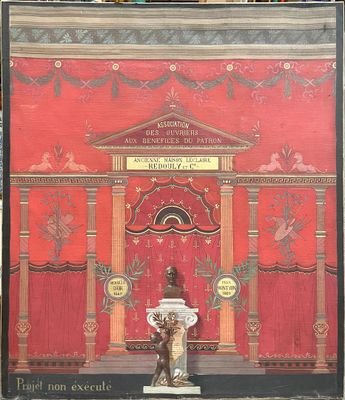 a picture of a red building with a statue in front of it