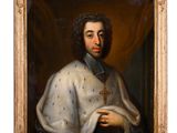 portrait of a man in a white robe with a cross in his hand
