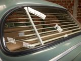a car that has a lot of luggage in the window