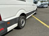 a white van that is parked in a parking lot