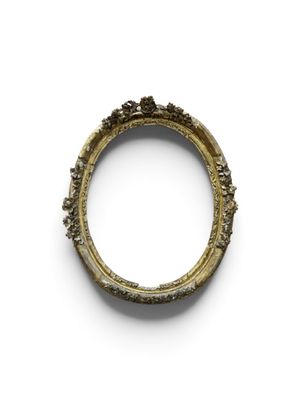 an old gold ring with a small flower decoration on it