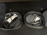 two suitcases that are packed with electronics in them