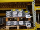 a large stack of boxes on a pallet in a warehouse