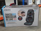 a box that has a massager on it in it