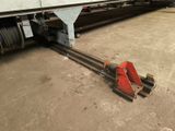 an image of a flatbed truck that has a couple of wheels attached to it