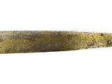 a large knife that is sitting on a white surface