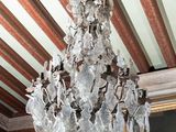 a chandelier hanging from the ceiling in a room