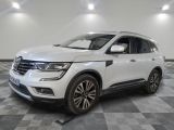 the white suv is parked in a large room with a checkered floor