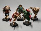 five figurines of different characters on display