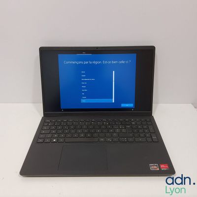 a laptop that is sitting on a white table