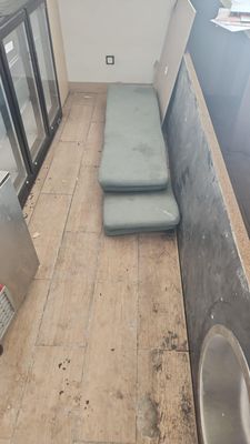 an image of a bathroom with a toilet and a bench