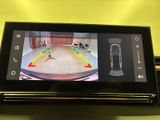 a picture of a car ' s rear view camera on the dashboard
