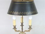 a lamp that is sitting on a table with a lamp on it