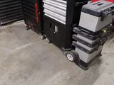 an image of a truck with a tool cart in the back