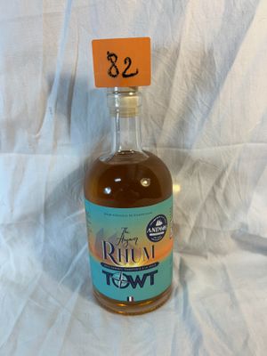a bottle of liquor that has a price tag on it