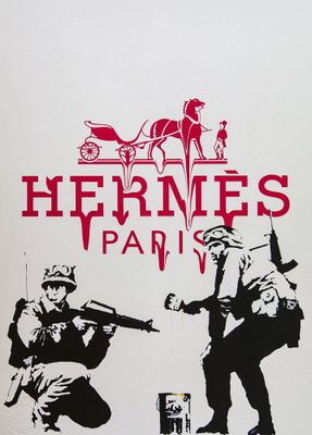 a poster of a man and a woman with guns