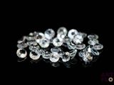 une image représentant un bouquet de diamants blancs sur un fond noir