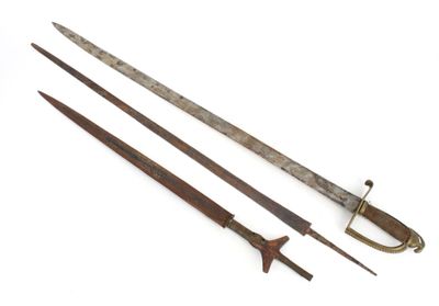 two old swords with wooden handles on a white surface