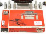 a box with a model train on it sitting on a table