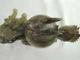 an image of a frog figurine on a white background