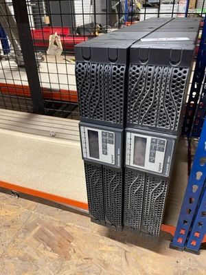 many racks of computer equipment in the store for sale