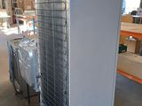 a large air conditioner sitting in the middle of a room