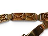 a close up of a bracelet with a clasp on it