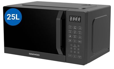 un four à micro-ondes noir posé sur un comptoir blanc