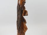 carved wooden statue of a woman with a crown on her head