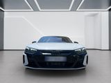 the front of a white car in a white room