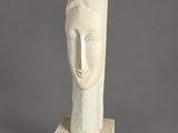 an image of a sculpture of a woman ' s head on a base