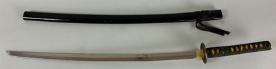 two different types of swords on display on a white surface