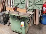 several pieces of wood are stacked on a table in a garage