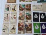 many cards laid out on a table with pictures