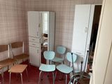 a room with a bunch of chairs in it