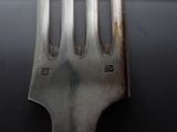 a fork that is sitting on top of a table