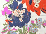 an image of a close up of a floral design on a piece of fabric
