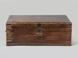 an old wooden box with a metal latch on the top