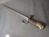 a knife that is laying on top of a table