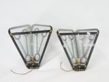 pair of triangular glass wall lights with brass fittings and brass fittings