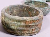 two bowls that are sitting next to each other on a table