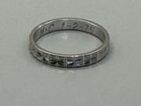 an image of a wedding ring with a date on it