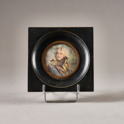 a small plate with a picture of a man on it