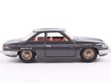 a toy car that is sitting on a white surface