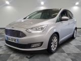 the silver ford c - max is parked on a checkered floor