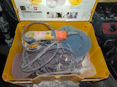 a yellow box with a bunch of tools inside of it