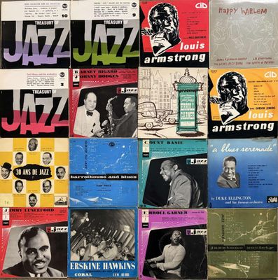 various jazz albums and records on a wall in a room